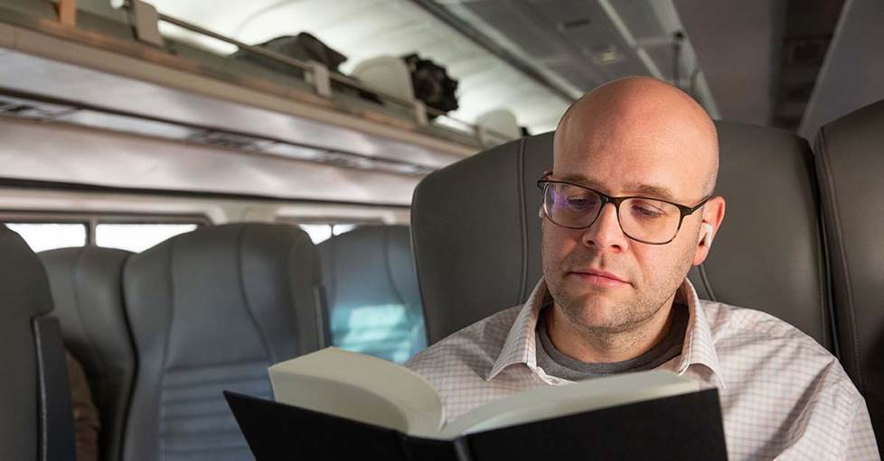 Jeff on the train with Bose QuietComfort Earbuds II